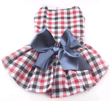 Load image into Gallery viewer, Red and Blue Checkered Dress adorned with a bow for your dog or cat.
